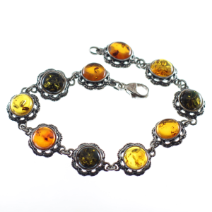 Pulsera en ámbar con plata de ley, diez flores coloridas